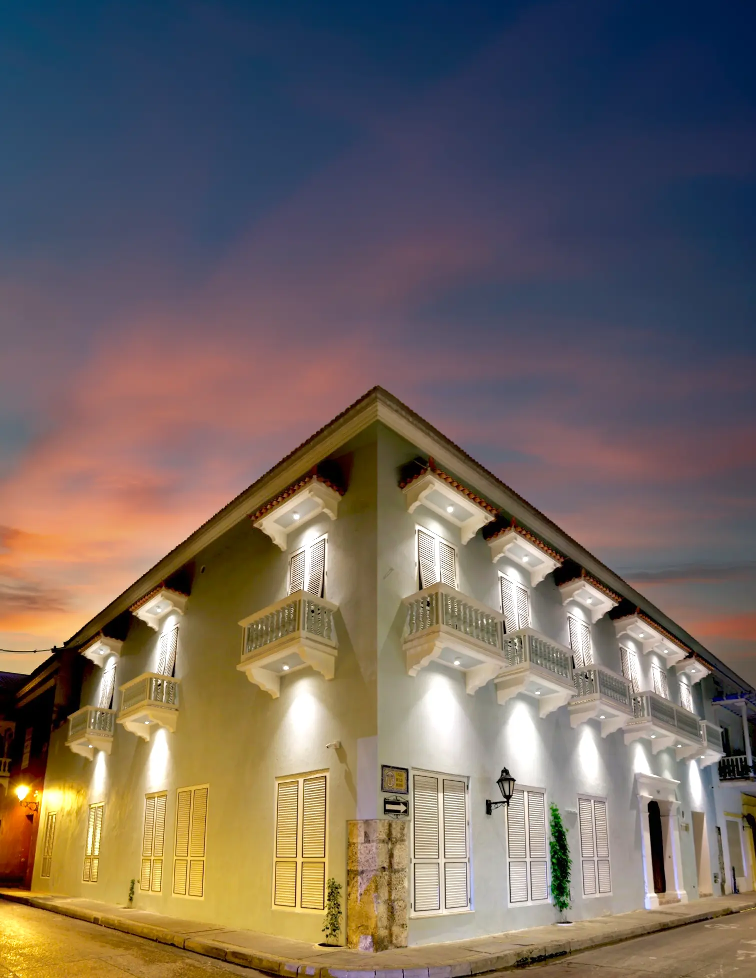 Exterior of Casa Libertadores at dusk